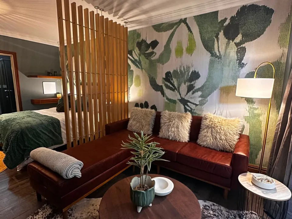 Renovated studio apartment in Cape Town CBD with a slatted timber divider